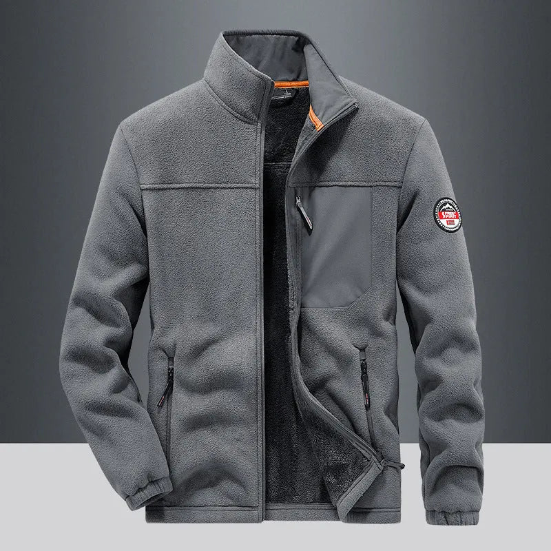 Man wearing a solid-colour grey thickening spandex fleece cardigan jacket with zipper pockets.