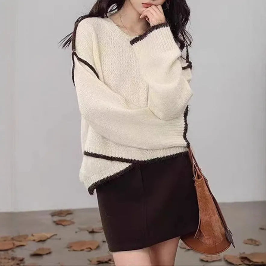 Women's idle style gray cotton loose pullover sweater on a plain background