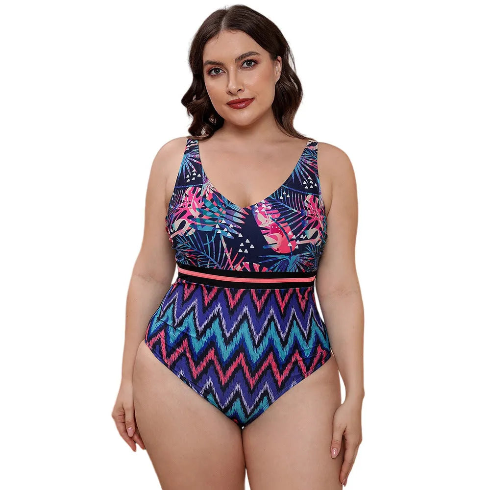 Blue printed stripe women's one-piece swimsuit with spaghetti straps on a mannequin.