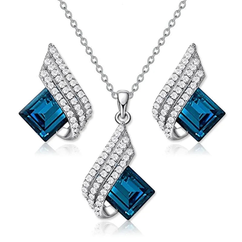 Glass pendant and alloy cross chain necklace with matching electroplated ear studs jewellery set in two style colours.