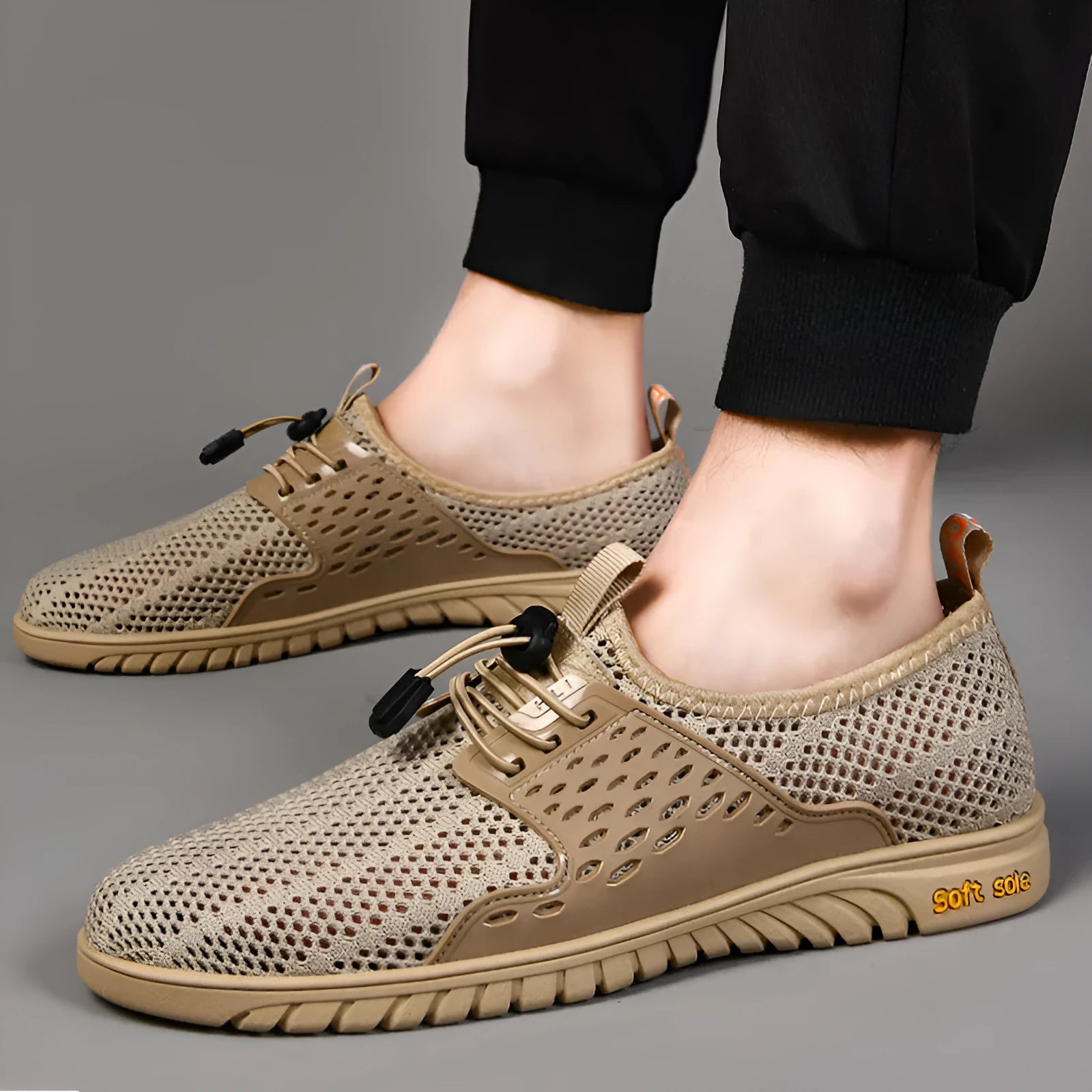 Men's breathable summer casual shoes with mesh upper and elastic band closure in black colour