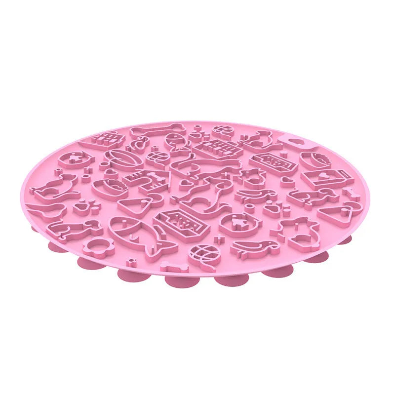 Round silicone pet licking mat with suction cup base in blue colour on kitchen floor
