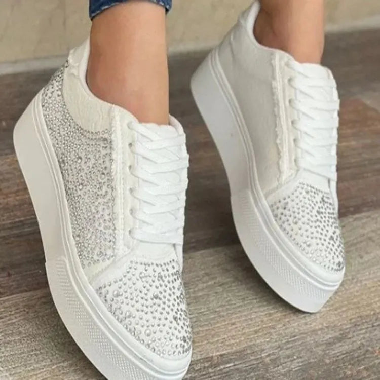Plus size women's black lace-up casual shoes with rhinestone detail on the round toe and a thick rubber sole.