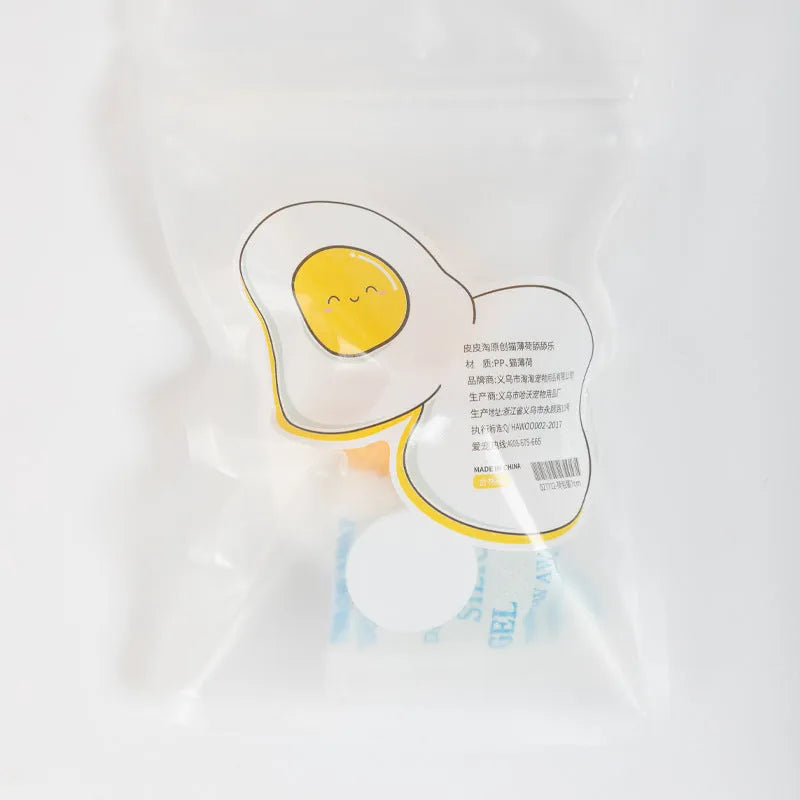 Interactive catnip ball toy in egg shapes for wall attachment and teeth cleaning