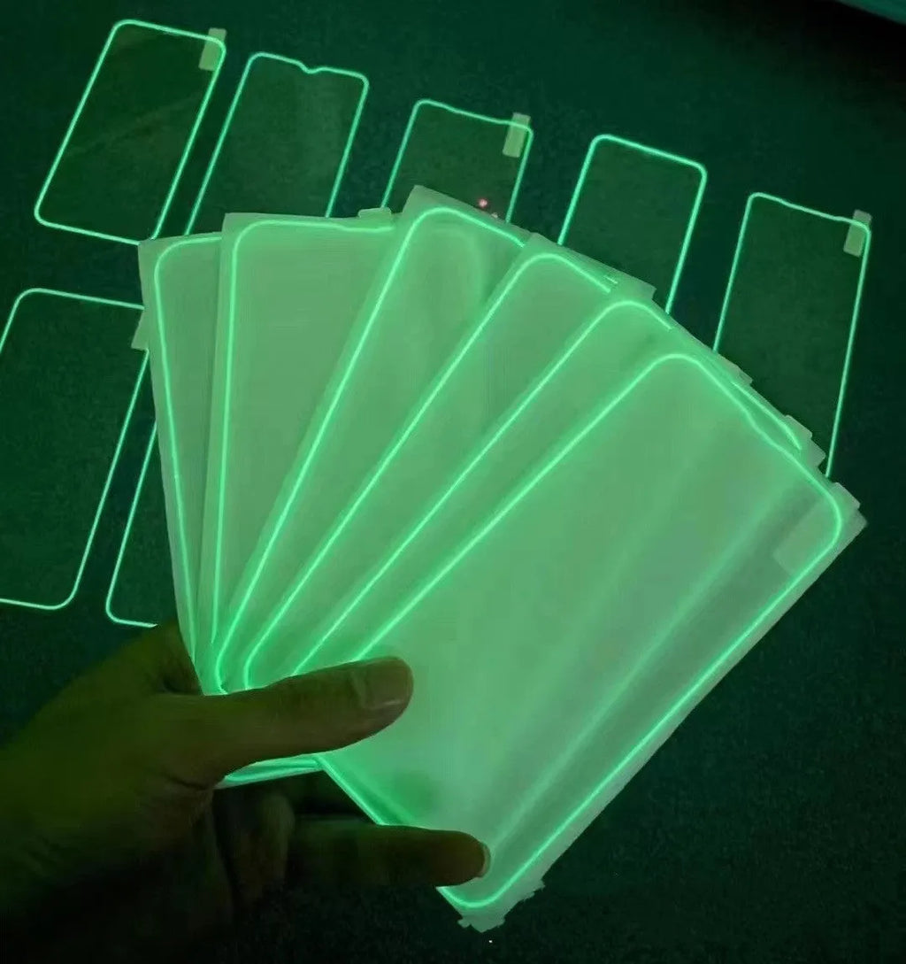 Fluorescent glowing tempered glass screen protector for iPhone on a dark background.