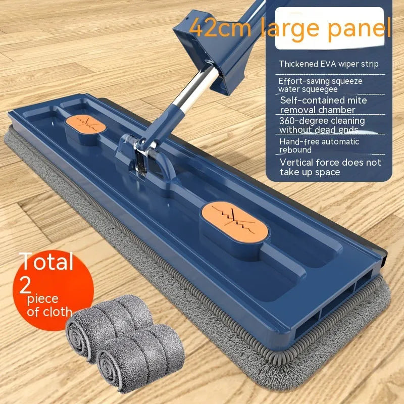 Large flat mop with stainless steel handle and blue mop cloth on hard floor