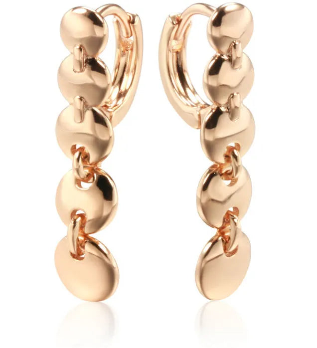 Gold-coloured retro circle earrings with 8cm diameter woven copper construction