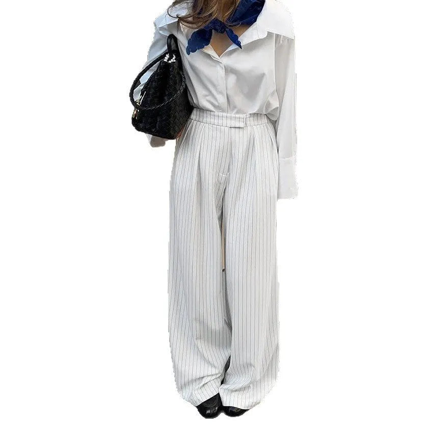 Women's white striped wide-leg loose fit trousers with front zip for commuting office wear