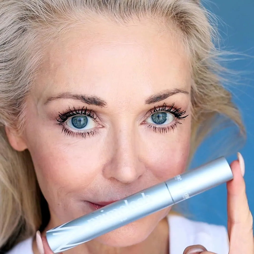 Black eyelash brush and comb beauty tool for separating and defining lashes