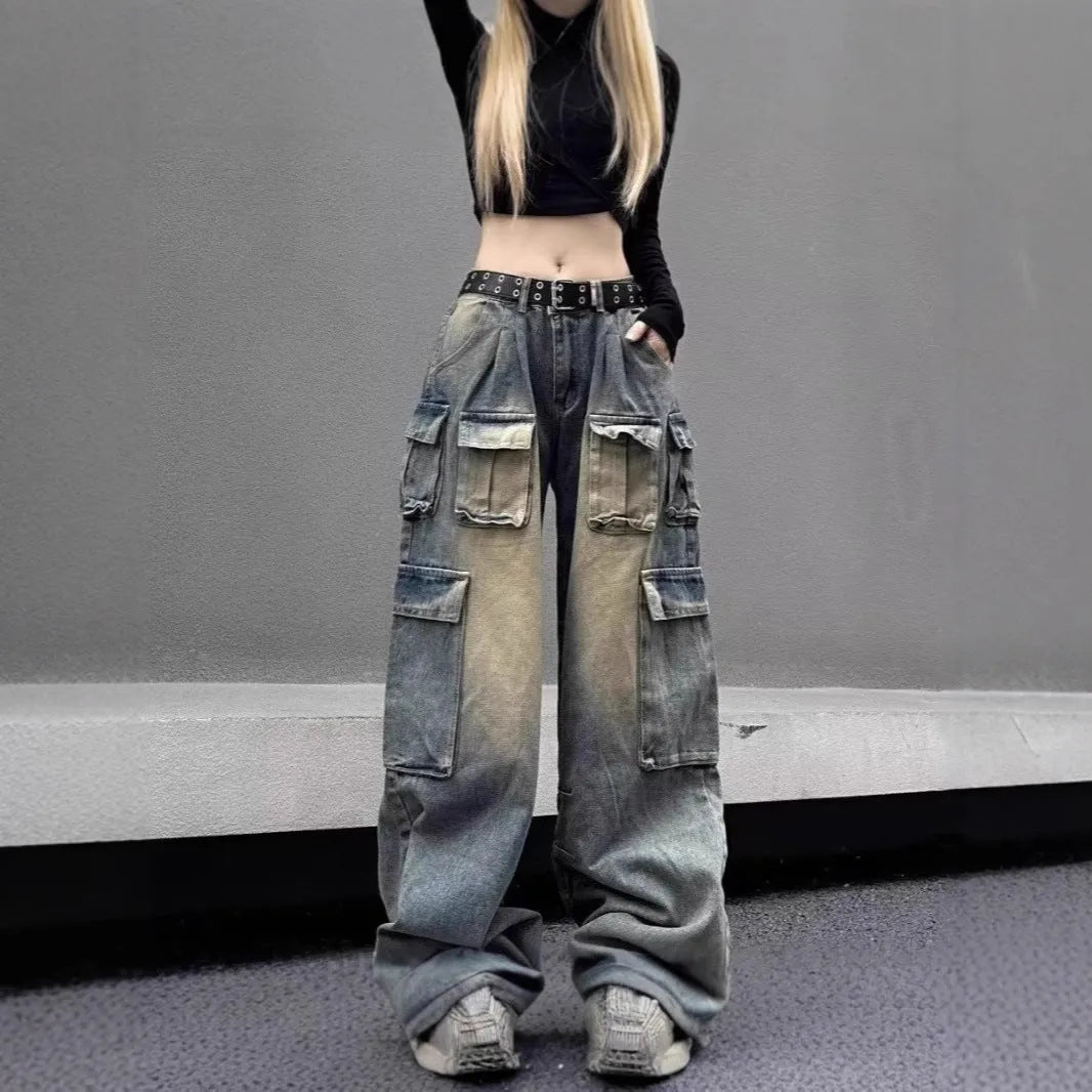 Men's light blue loose fit distressed jeans with multiple pockets on a straight leg.