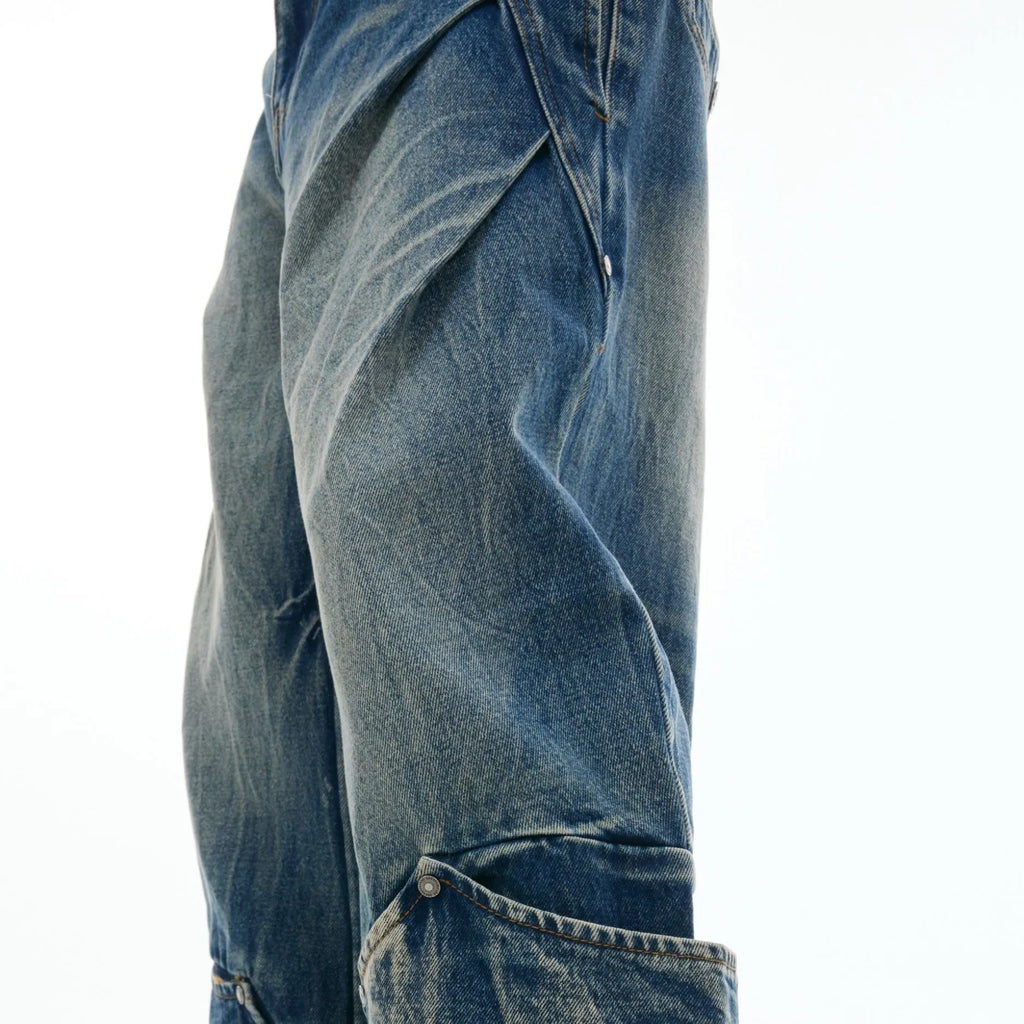 Men's verdant blue jeans with retro washed burst pattern and curved knife style loose fit design