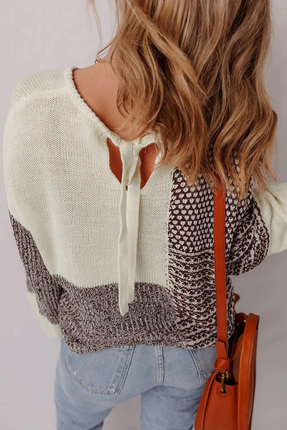 Dark khaki colour block loose sweater with back tie detail and drop shoulders.