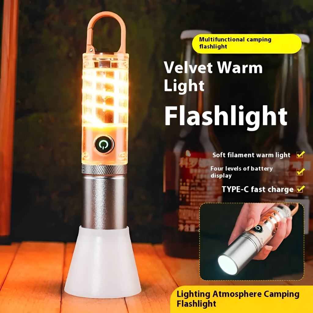 Orange 10W LED flashlight with optical zoom lens and keychain hook shown with USB charging cable