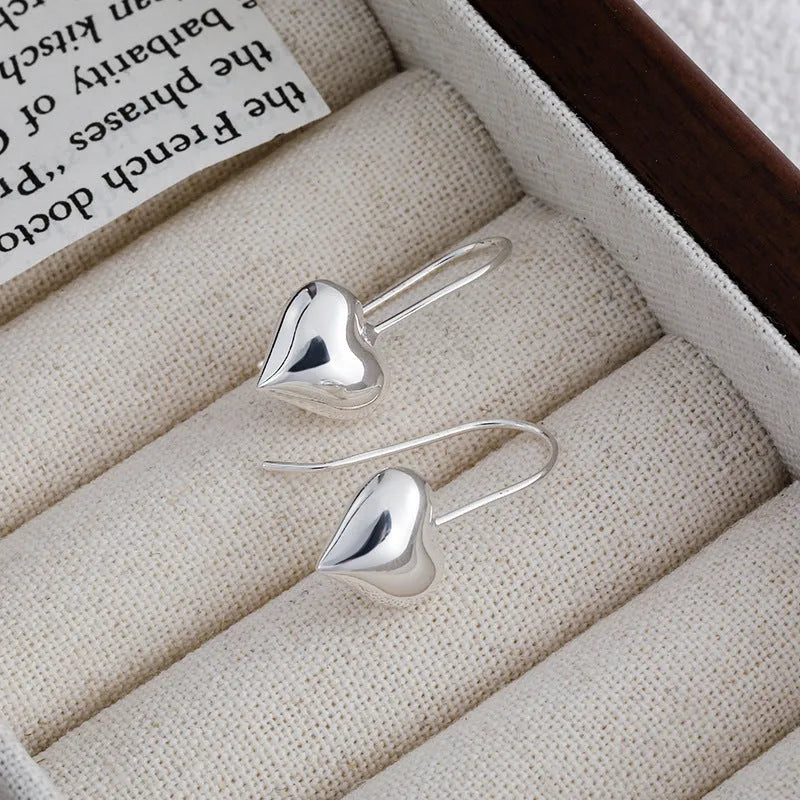 Korean style glossy heart-shaped copper earrings with silver finish for women