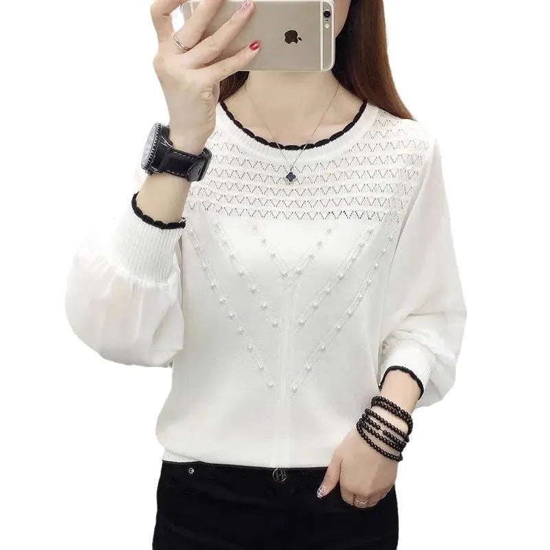 Loose-fit long sleeve round neck women's polyester top in solid colour, available in black, pink, and white.