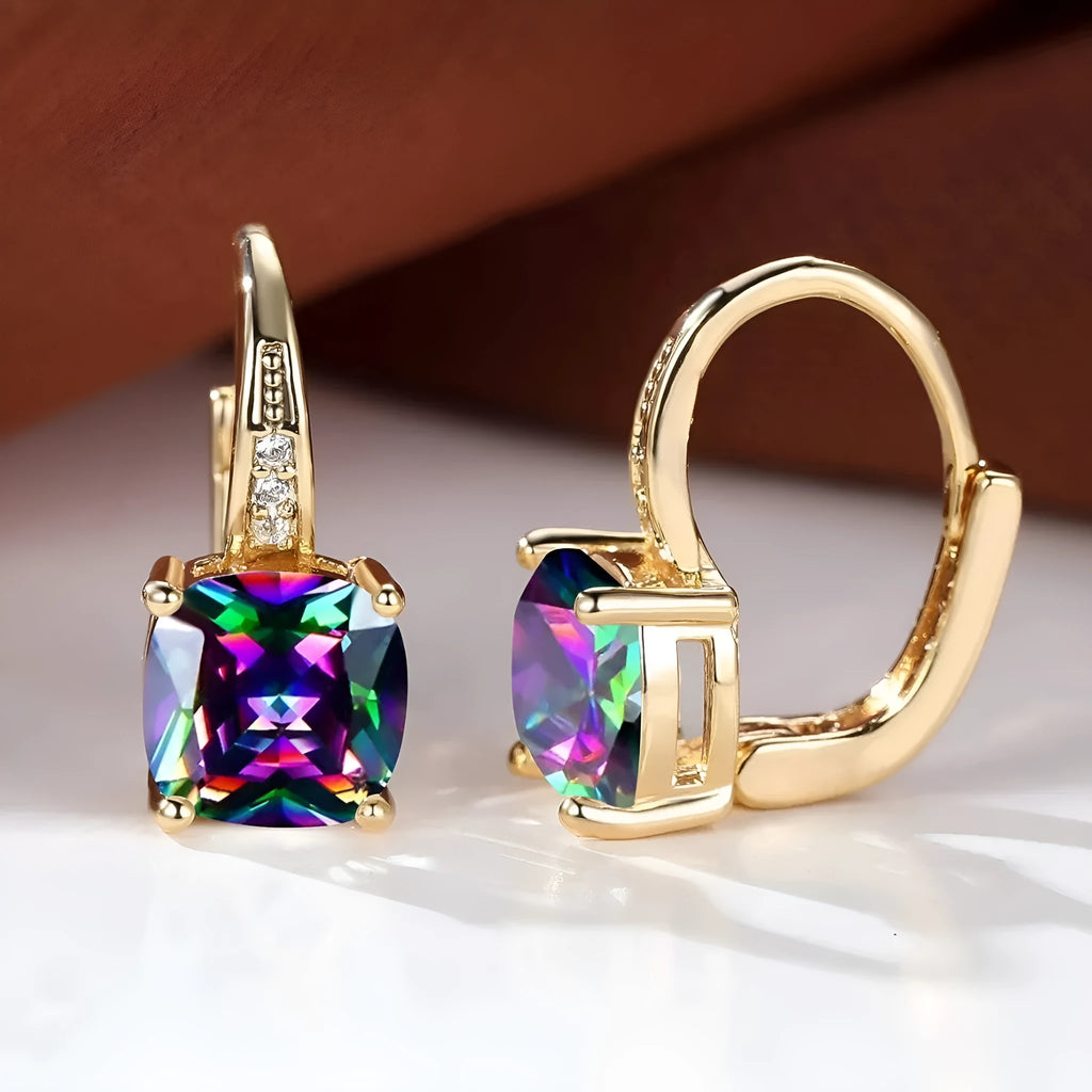 Square geometric moissanite ear clip in gold electroplated finish on copper.