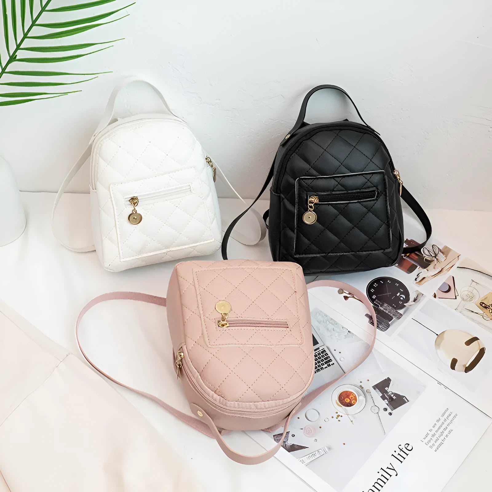 Girls' Korean style embroidered backpack in hard PU measuring 16x7x19cm in black, white or pink