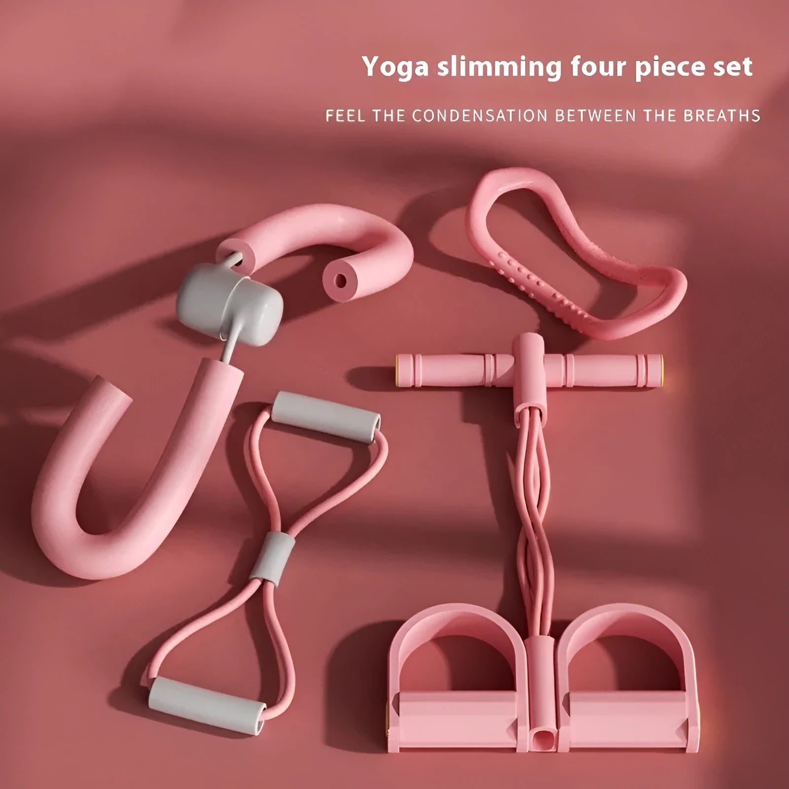 Yoga four piece fitness set showing leg beauty device, yoga ring, pedal tension device and eight character tension rope