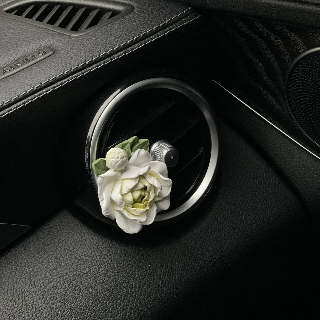 Jasmine scent solid gypsum car air vent clip diffuser measuring 5 by 4.5 centimetres.