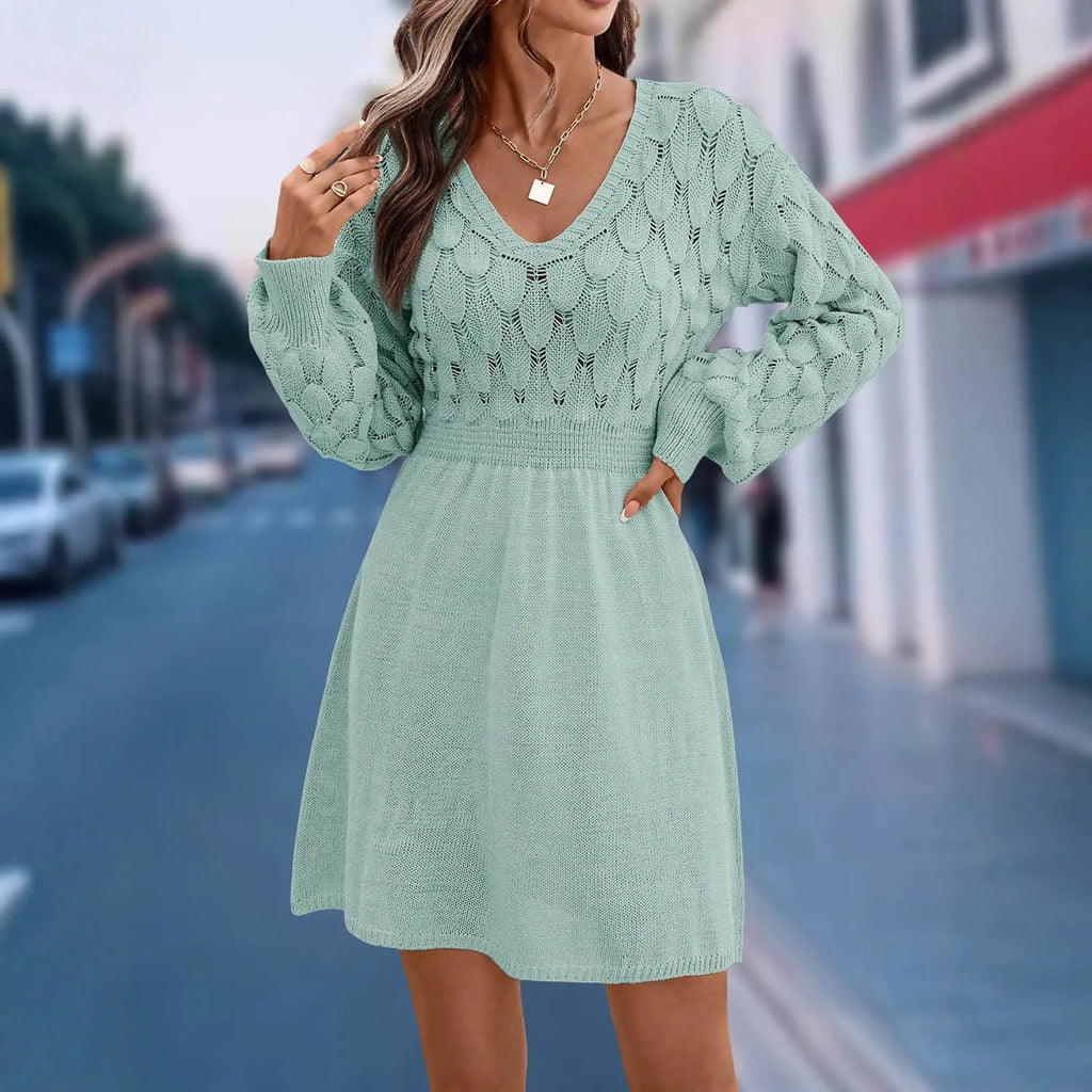 Ethnic style V-neck long sleeve beach dress with high waist and artistic 3D pattern in apricot colour.