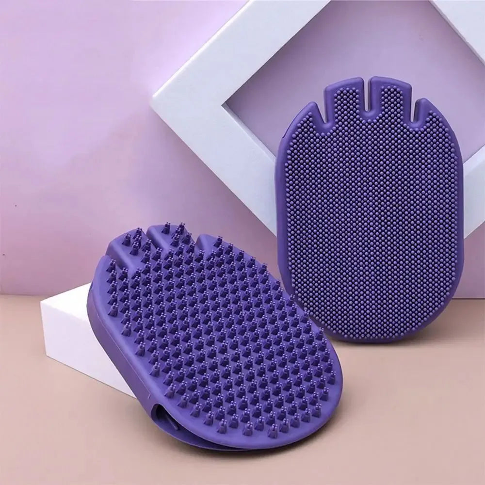 Purple massaging pet shampoo brush with soft TPR bristles, dual-sided dog grooming tool on white background