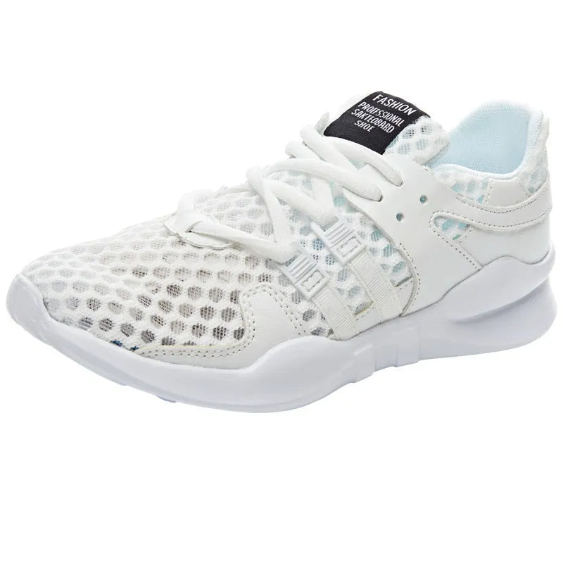 Breathable hollow mesh sneakers in black and white colours with round toe design