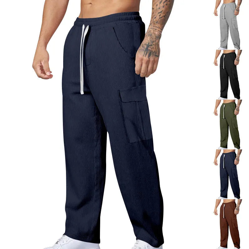 Men's corduroy cargo trousers with wide-leg cut and drawstring waist in navy blue colour