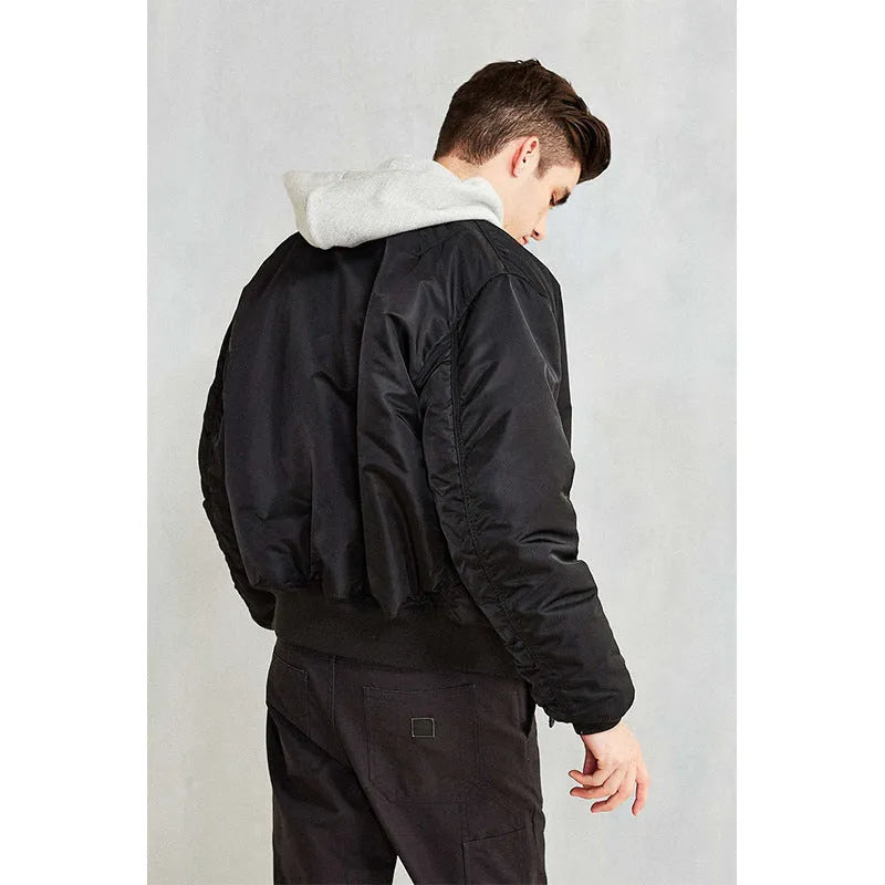 Men's loose fit nylon pilot jacket in army green, shown with cotton padding and double-sided wear-resistant construction.