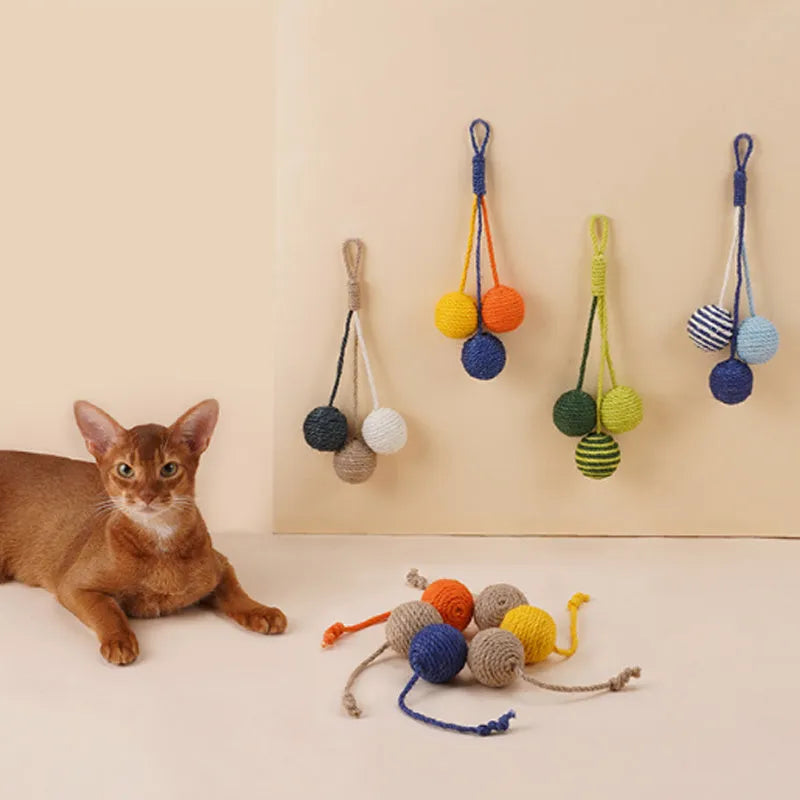 Cat toy set with blue bite-resistant teaser stick and catnip ball on white background