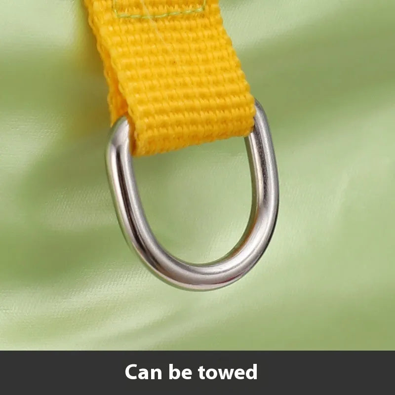 Green waterproof cotton dog coat on a dog, showing four-legged design.