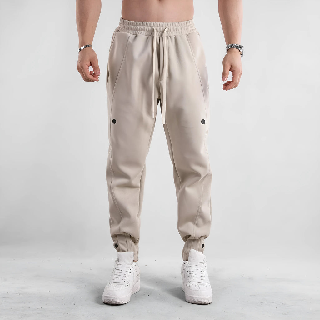 Men's cotton loose fit casual sports trousers in light blue, side view, with mid waist and straight leg