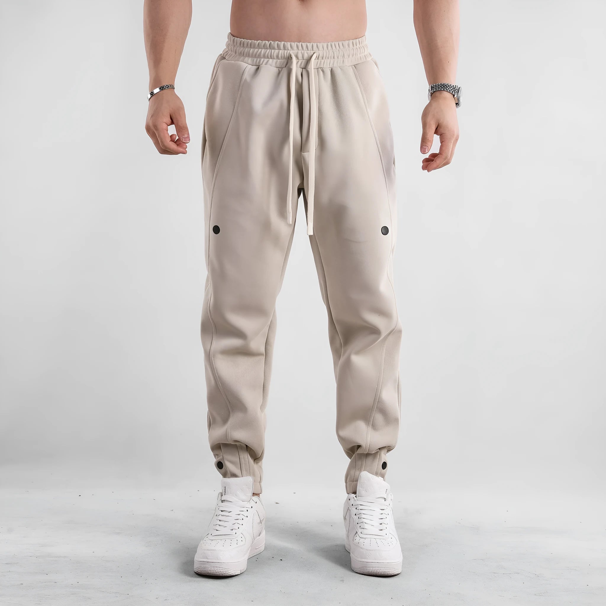 Men's cotton loose fit casual sports trousers in light blue, side view, with mid waist and straight leg