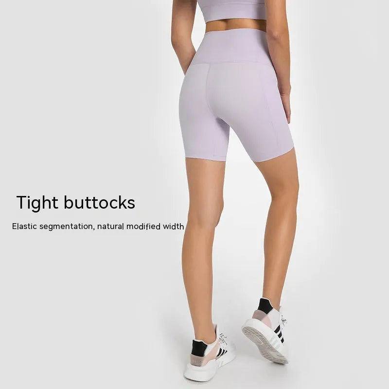 Women's tight sports shorts in black cotton blend fabric for running and fitness activities