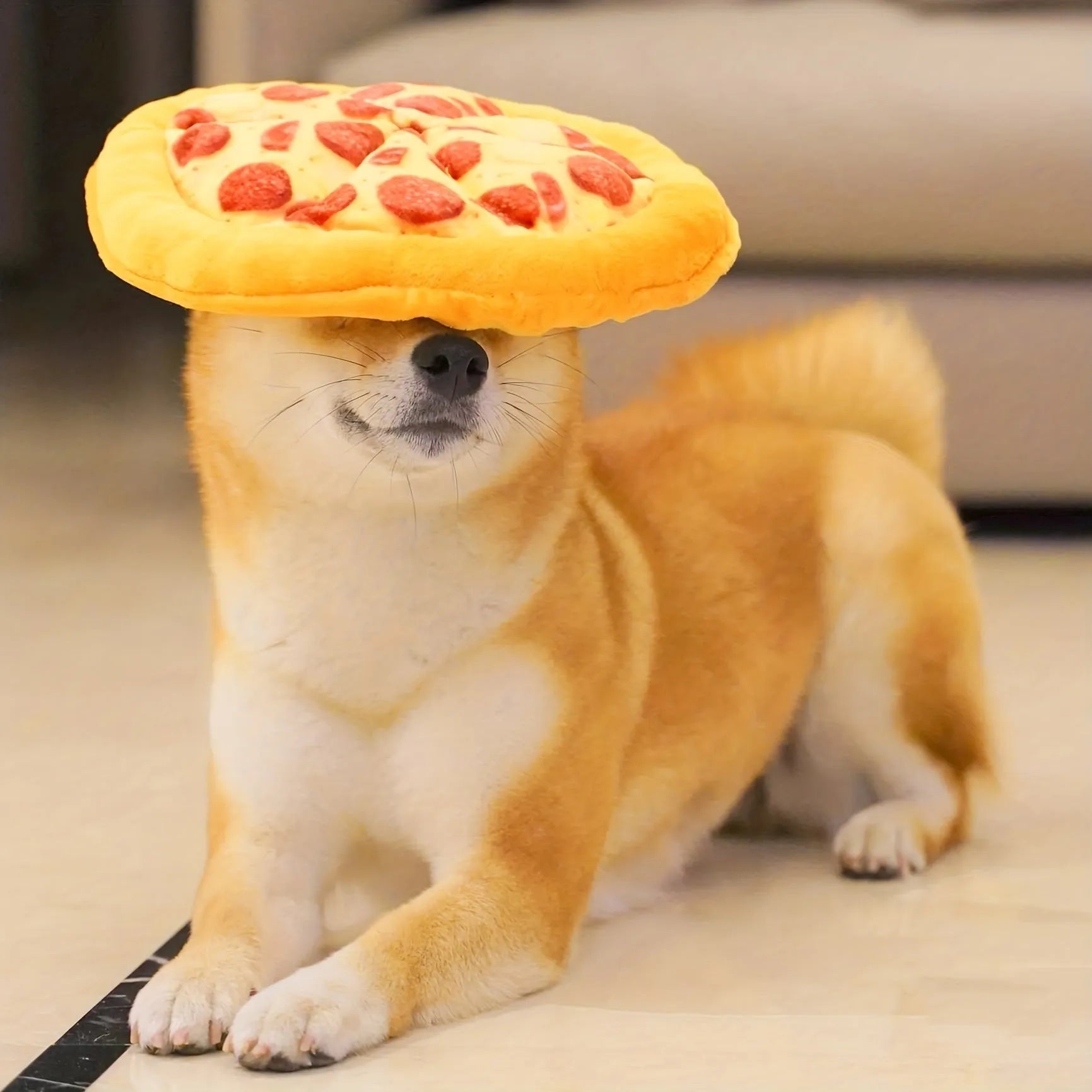 Yellow pizza slice dog chew toy with teddy bear design on top