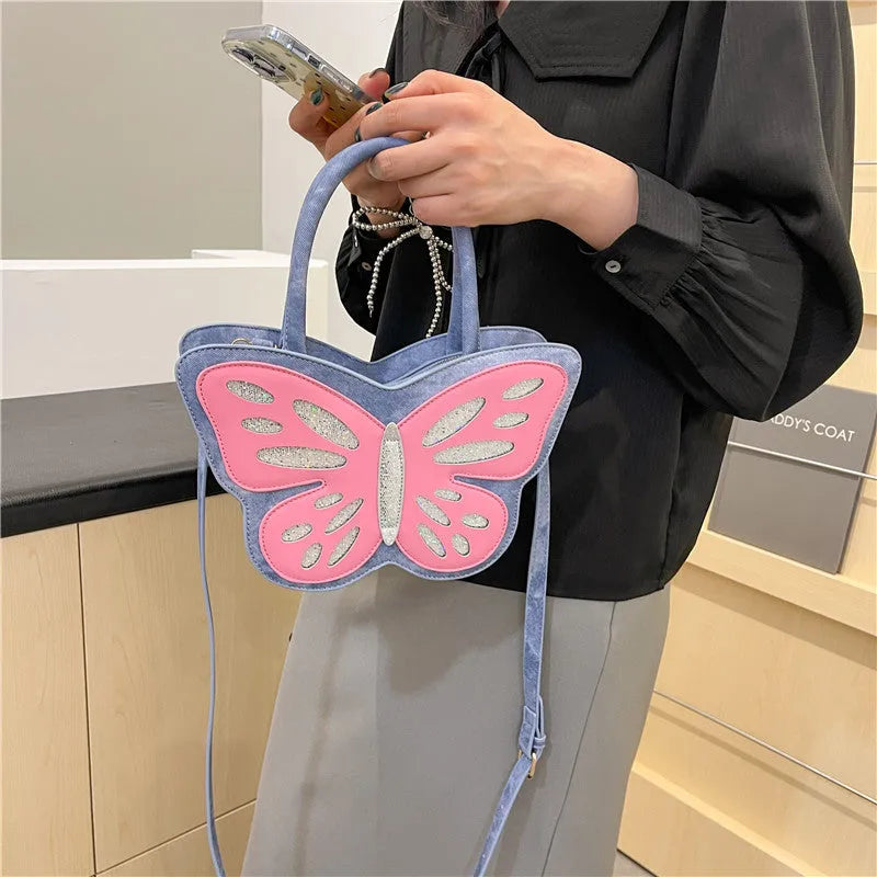 Square-shaped crossbody bag in PU leather with contrast detailing showing front view