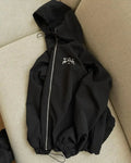 Men's grey loose fit hooded jacket with polyester construction for sun protection