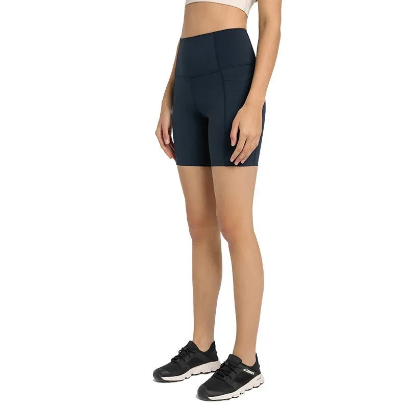 Women's tight sports shorts in black cotton blend fabric for running and fitness activities