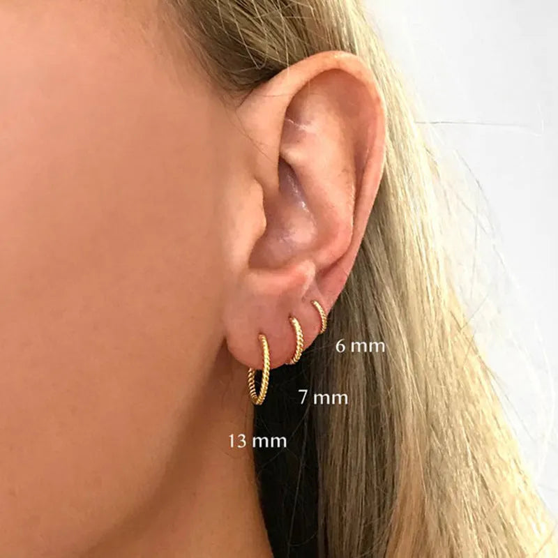 S925 sterling silver twisted string round hoop earrings in gold or platinum finish.