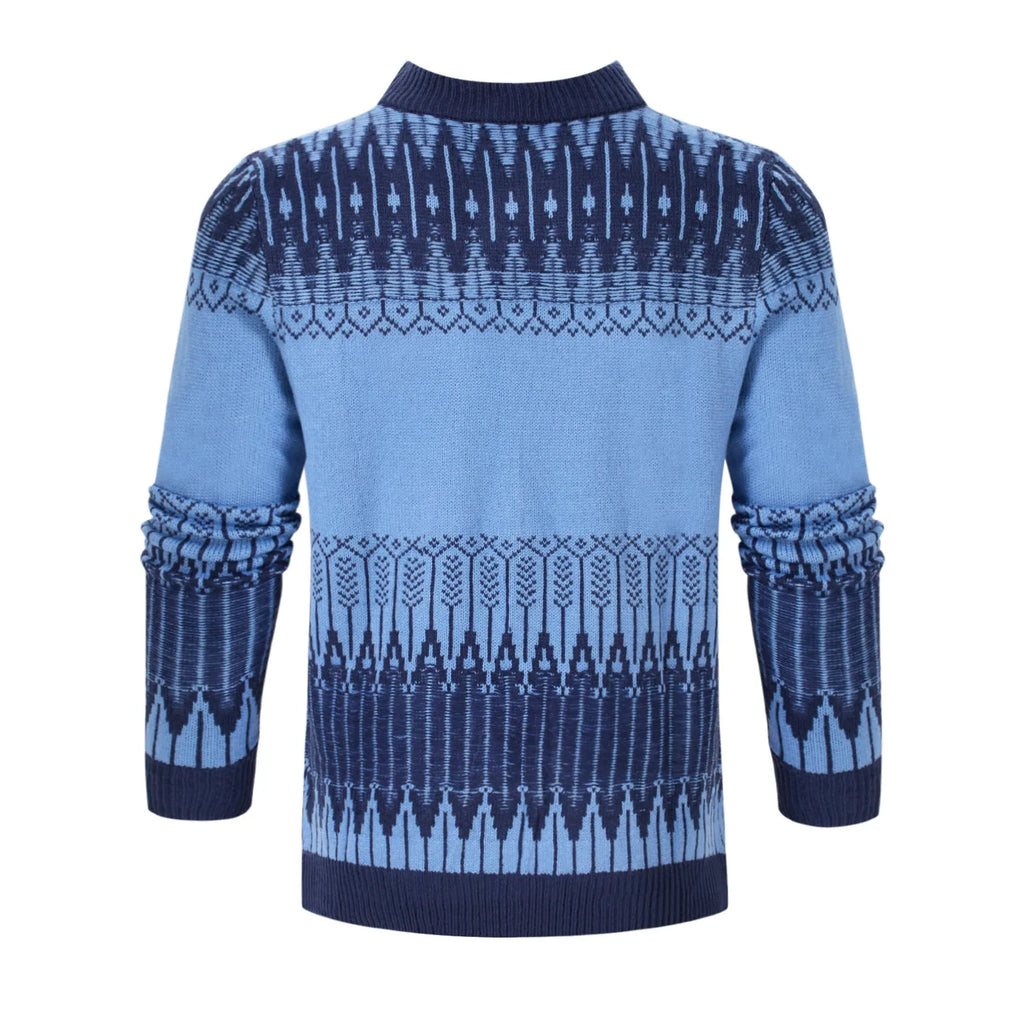 Man wearing a grey knitted crew neck pullover sweater with long sleeves.