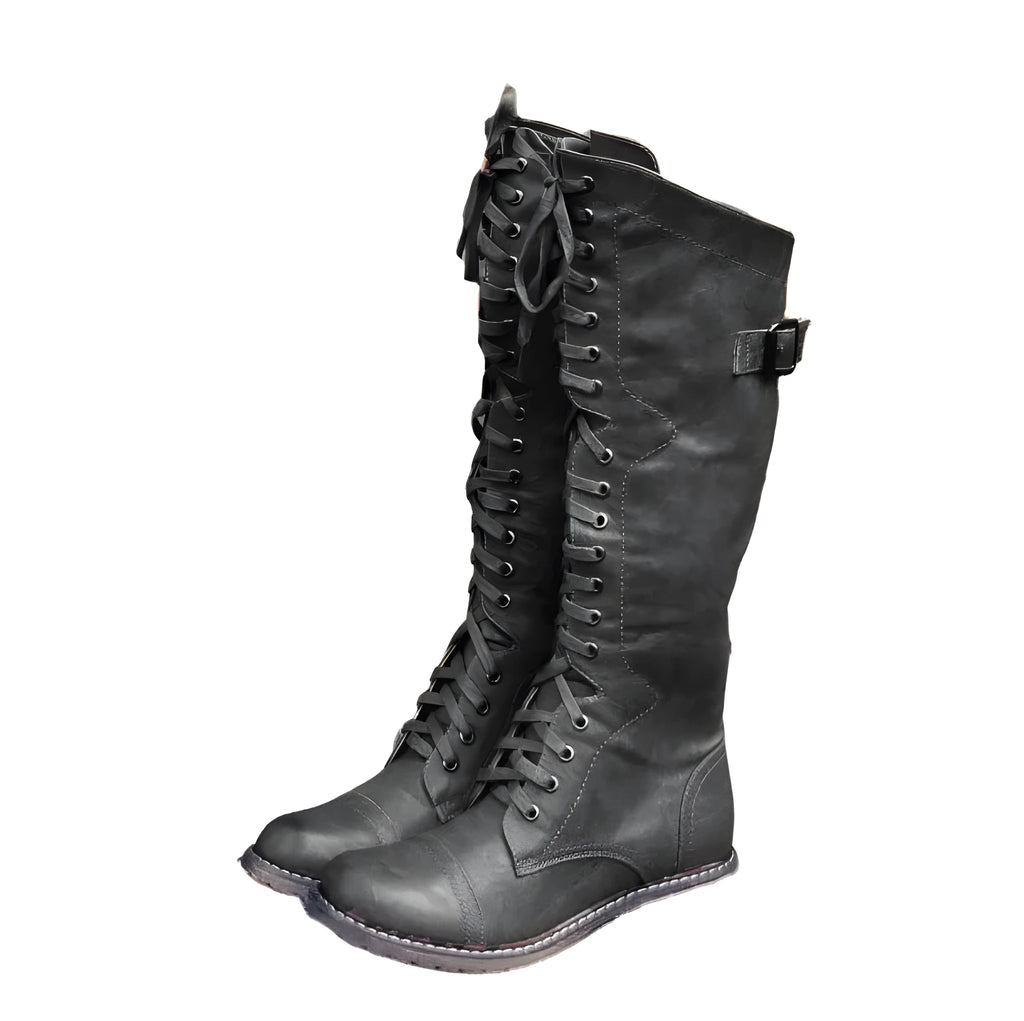 Women's black cross strap knight boots in artificial PU material with ankle straps