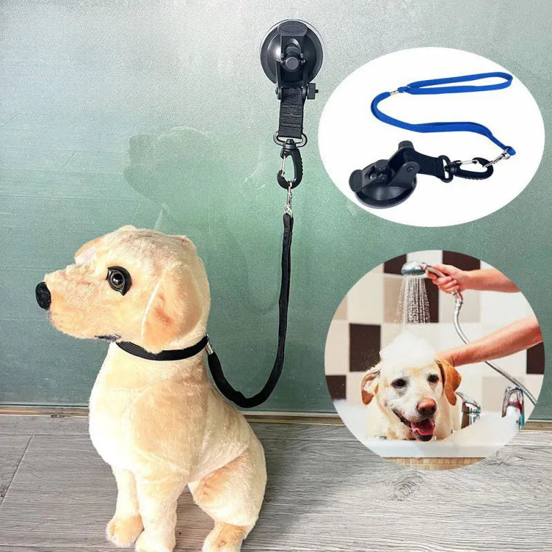 Black and blue suction cup dog bath restraint kit with large and small cups on a tub.