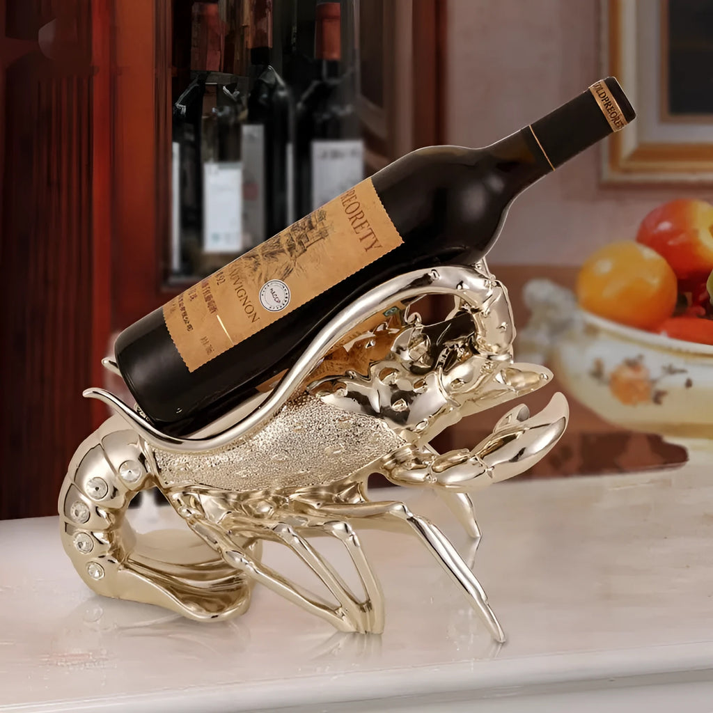 Lobster-shaped wine rack ornament in rose gold or silver metallic finish on tabletop