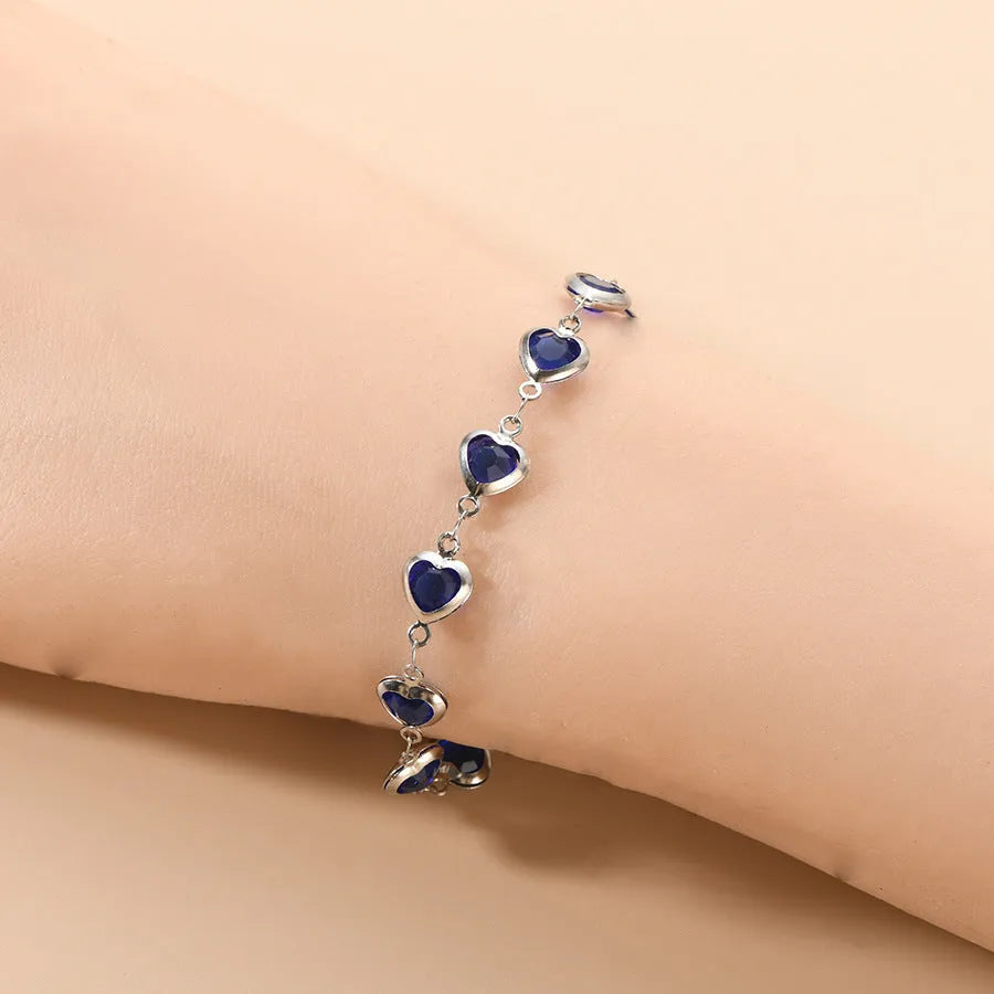 Devil's Eye Creative Heart Bracelet in stainless steel with geometric design and multiple colour options