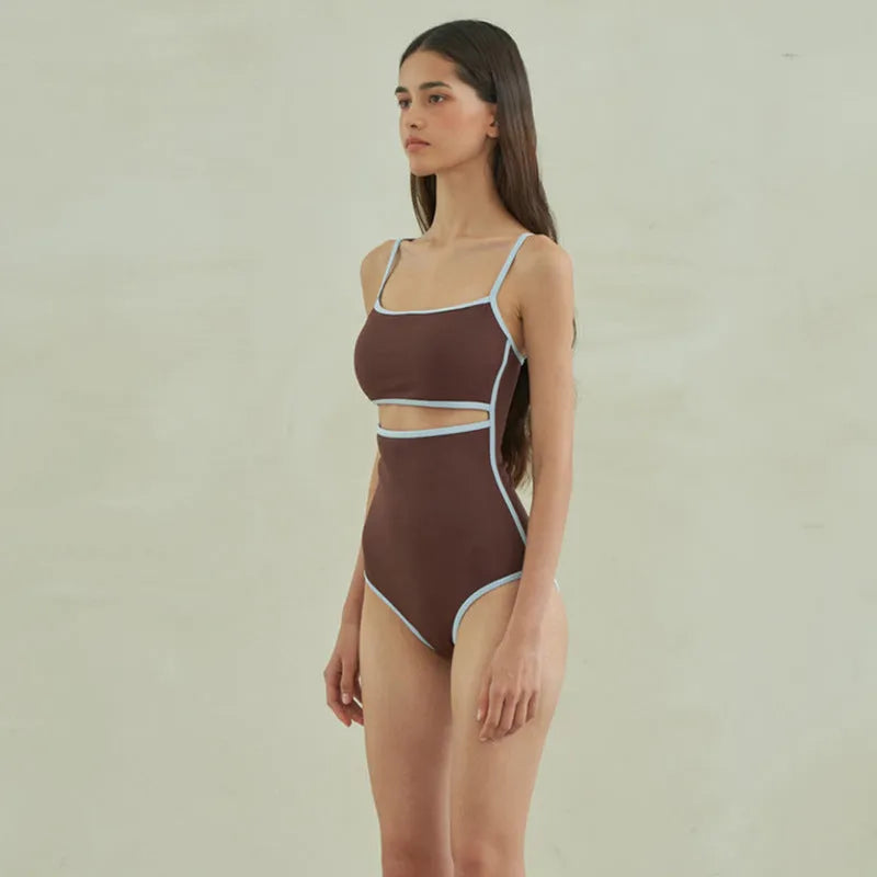 Brown women's one-piece swimsuit with triangle top design