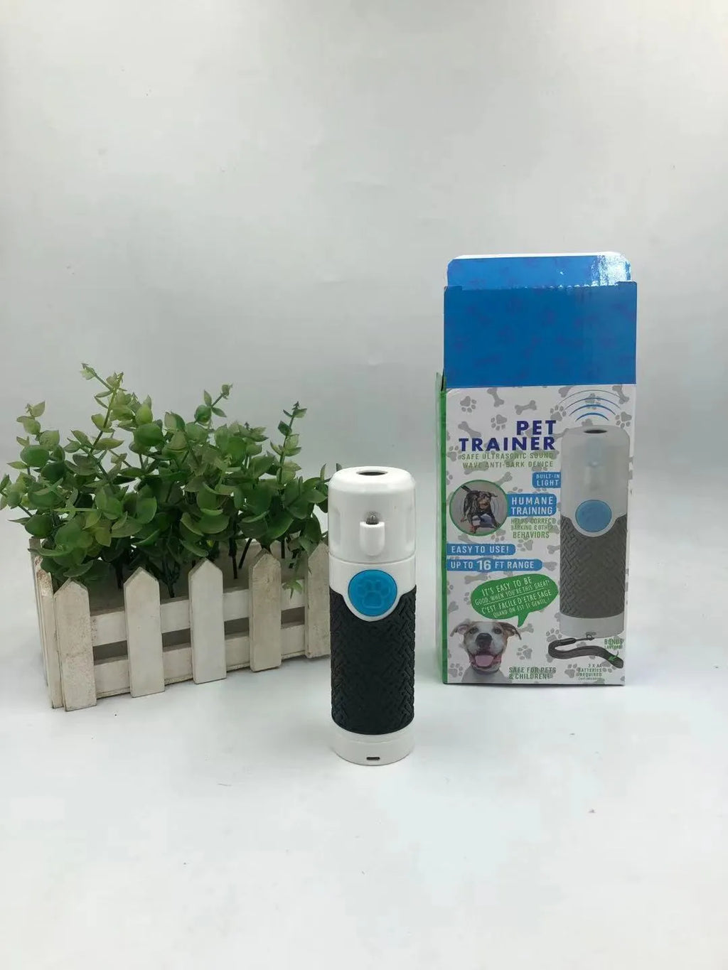 White ABS plastic handheld ultrasonic dog bark trainer device