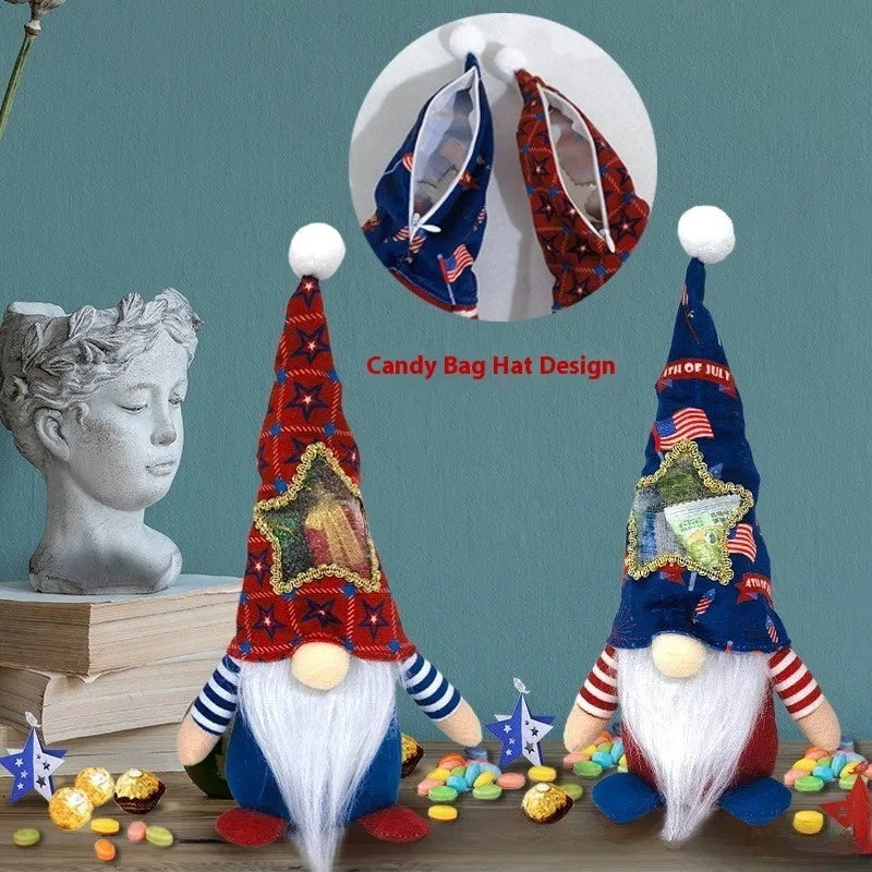 Two faceless baby doll Christmas ornaments dressed in red reindeer suits with white trim, made from cloth.