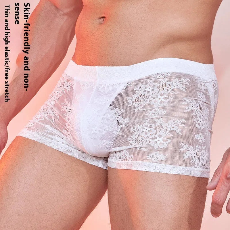 Men's black lace-trimmed nylon boxers laid flat, showing free size fit.