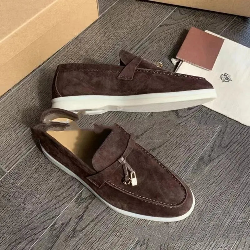 Gommino slip-on loafers with high-top design, round toe with steel head, and sewing line detail on artificial PU upper