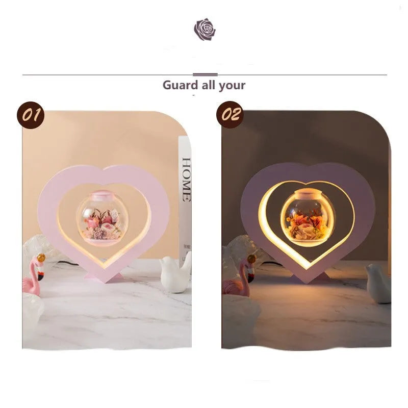 Pink preserved real rose ornament in a decorative case with optional base and Bluetooth speaker.
