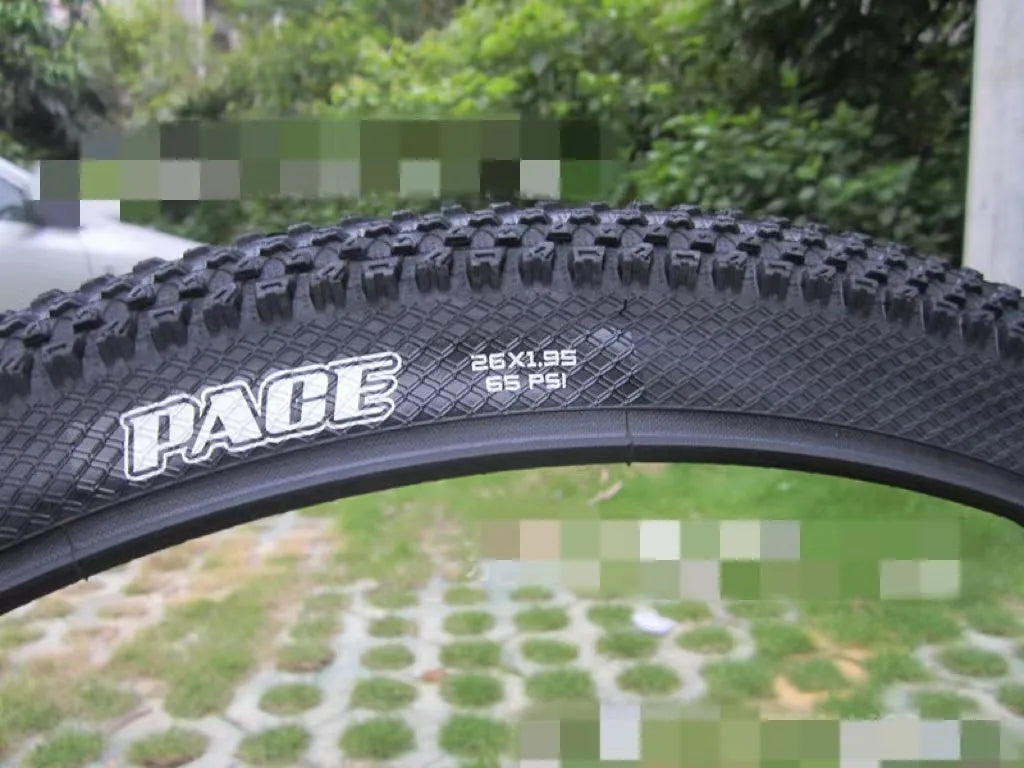 Ultralight puncture-resistant mountain bike tyre showing tread pattern, available in multiple wheel sizes.